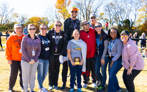  Many staff members outside for field day